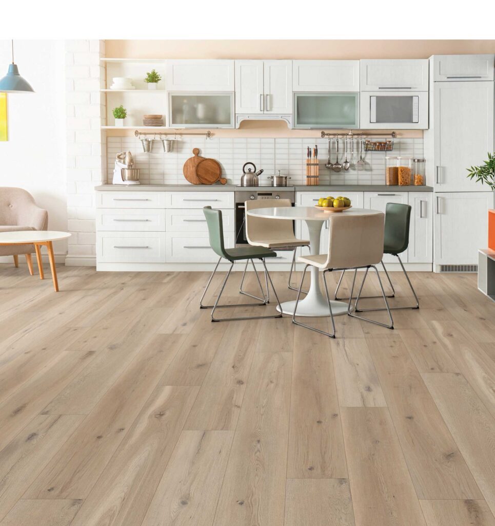Modern white kitchen with LVT floors.
